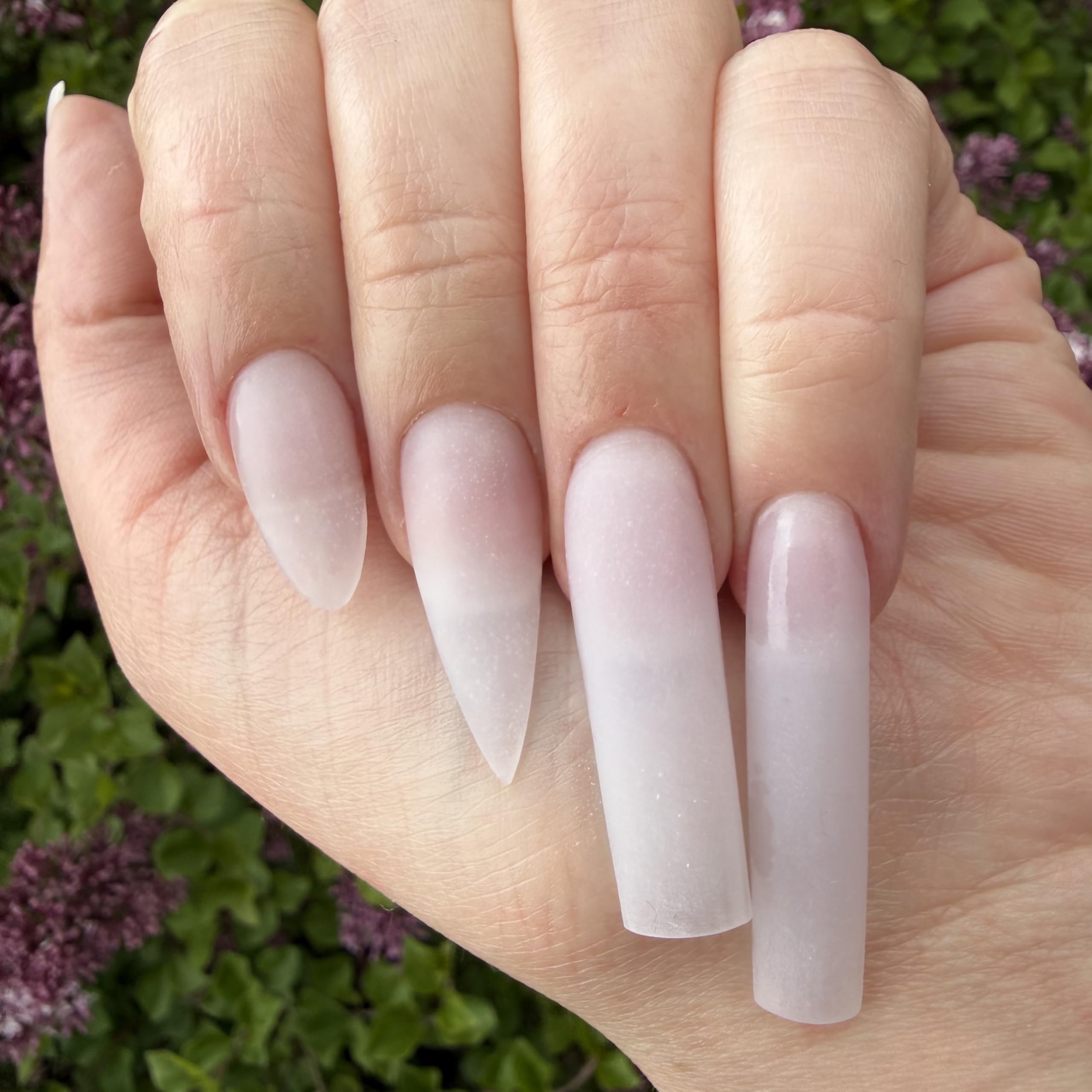 Finished sculpted extension using DeEnti powder showing durable result