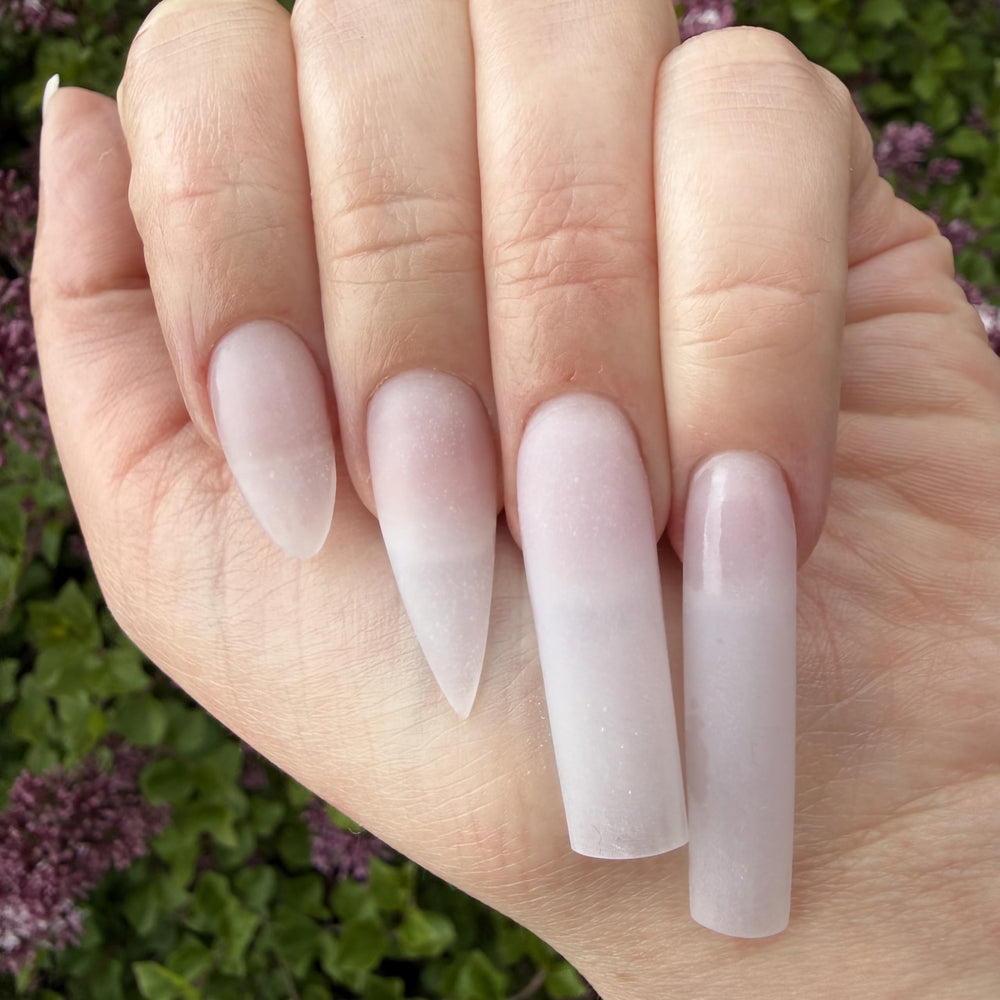 Finished sculpted extension using DeEnti powder showing durable result