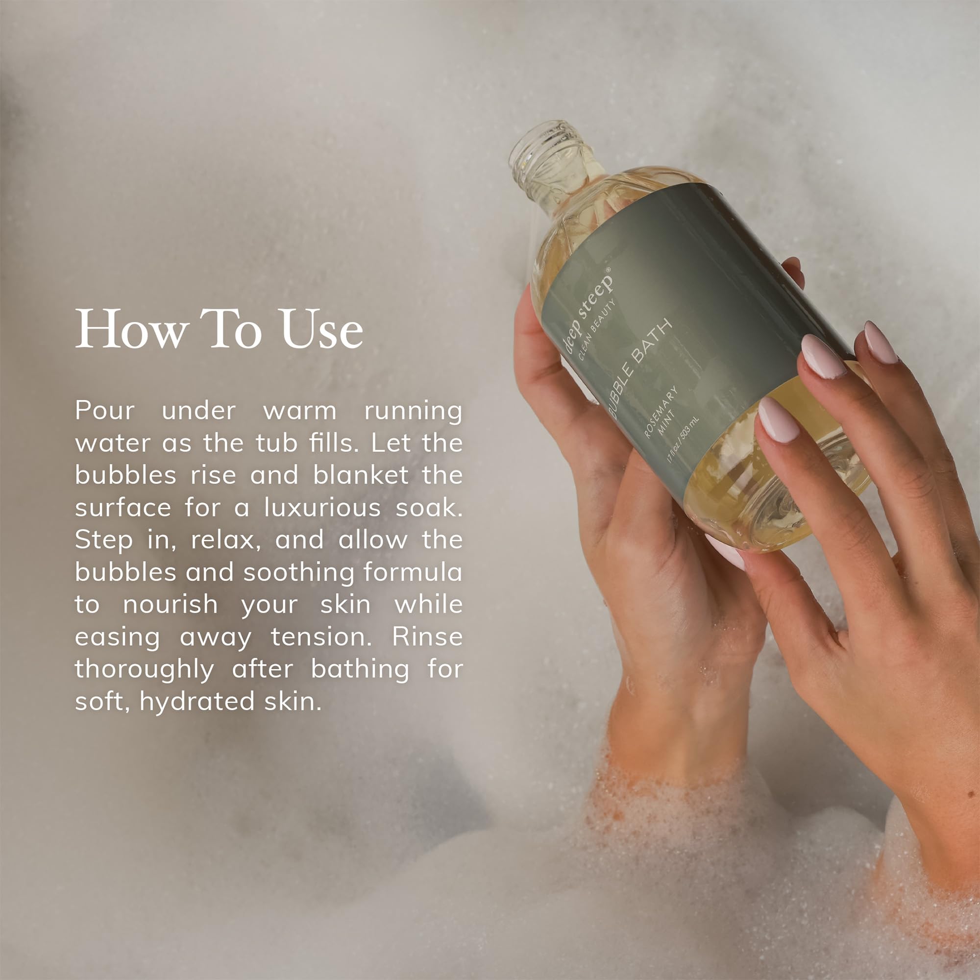 Deep Steep bottle staged next to bath accessories conveying spa-like relaxation