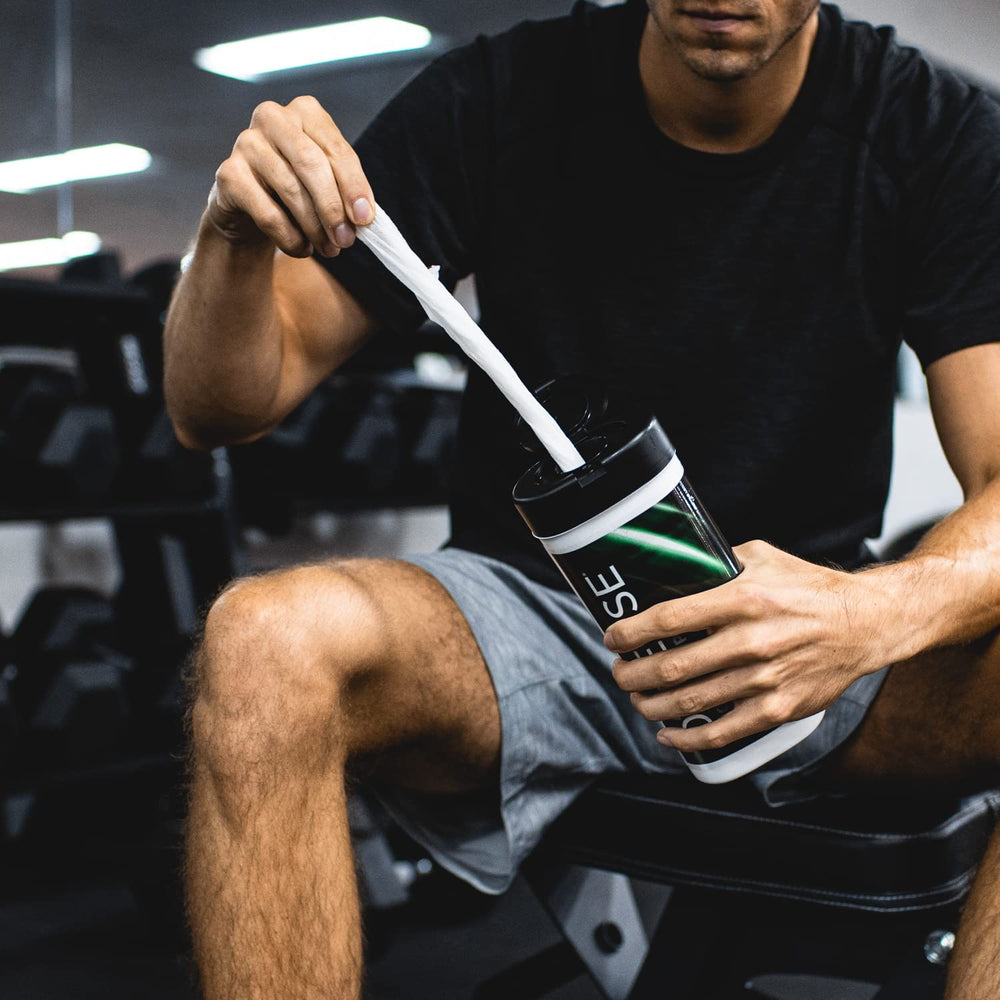 Defense Soap wipe in use on athlete after training for quick cleansing