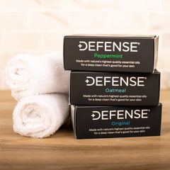 Defense Soap Oatmeal bar close-up showing oat particles for gentle exfoliation
