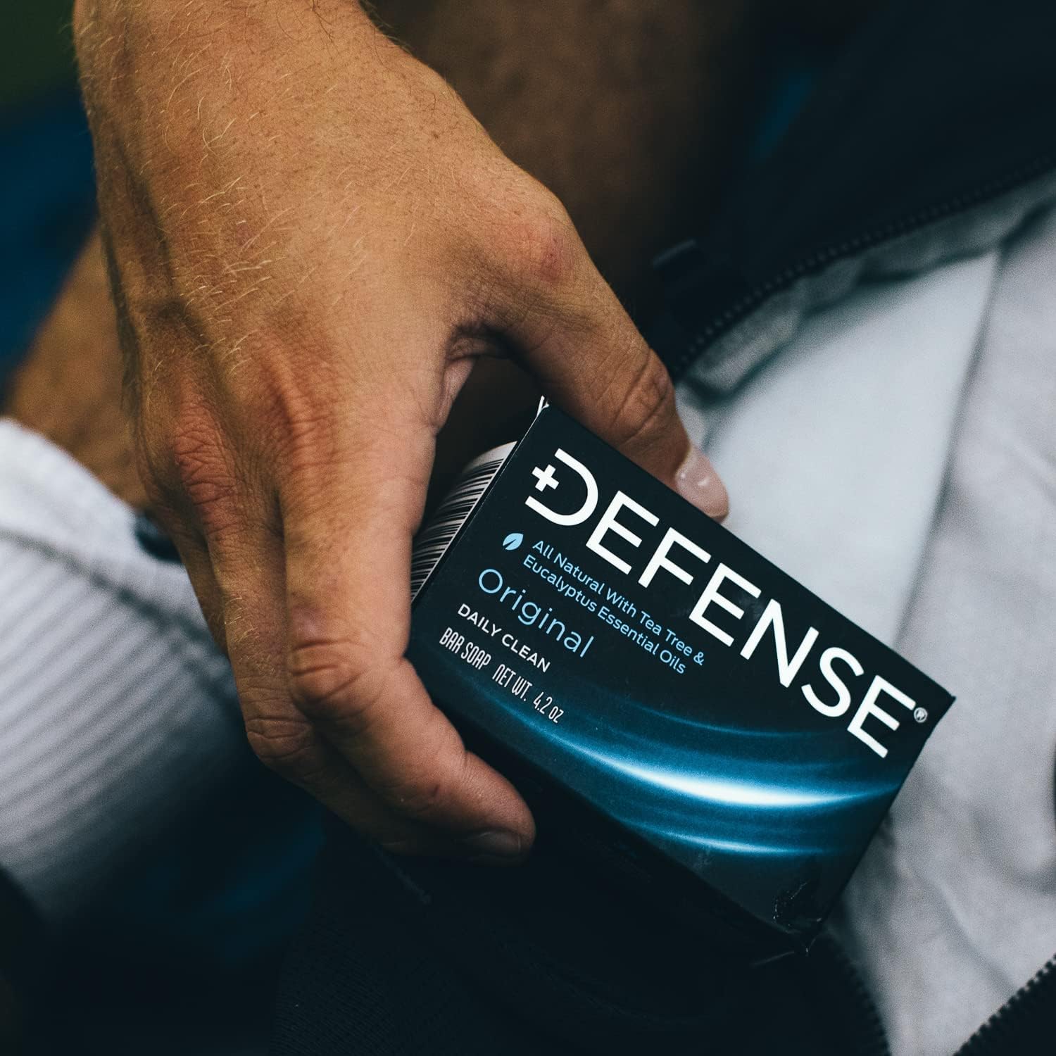 Defense Soap bar next to ruler showing size and travel-friendly portability