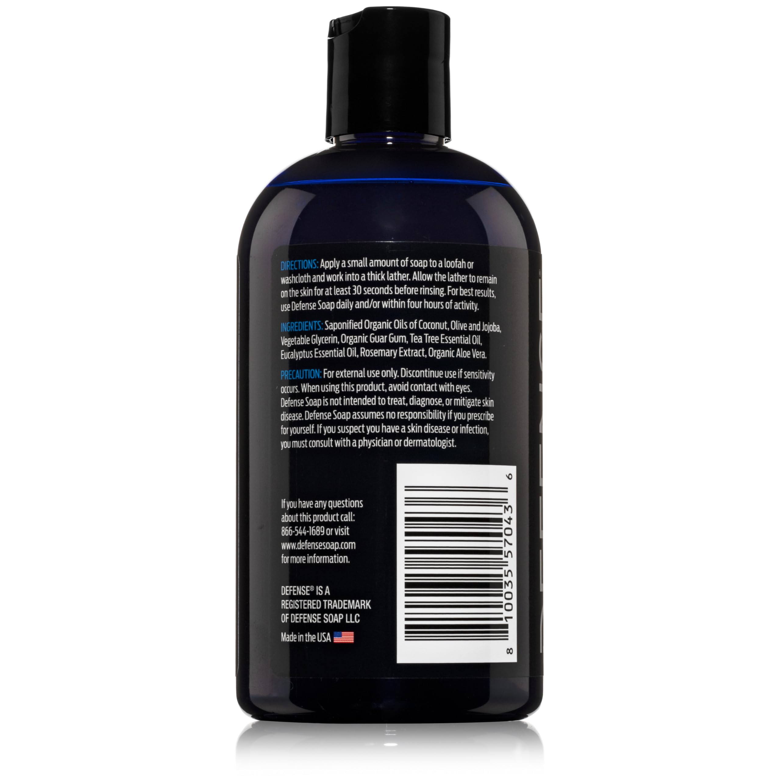 Defense Soap held in hand to show 12 oz size and travel-friendly portability