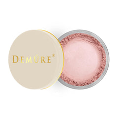 DEMÚRE brush applying blush closeup demonstrating seamless blending and natural finish