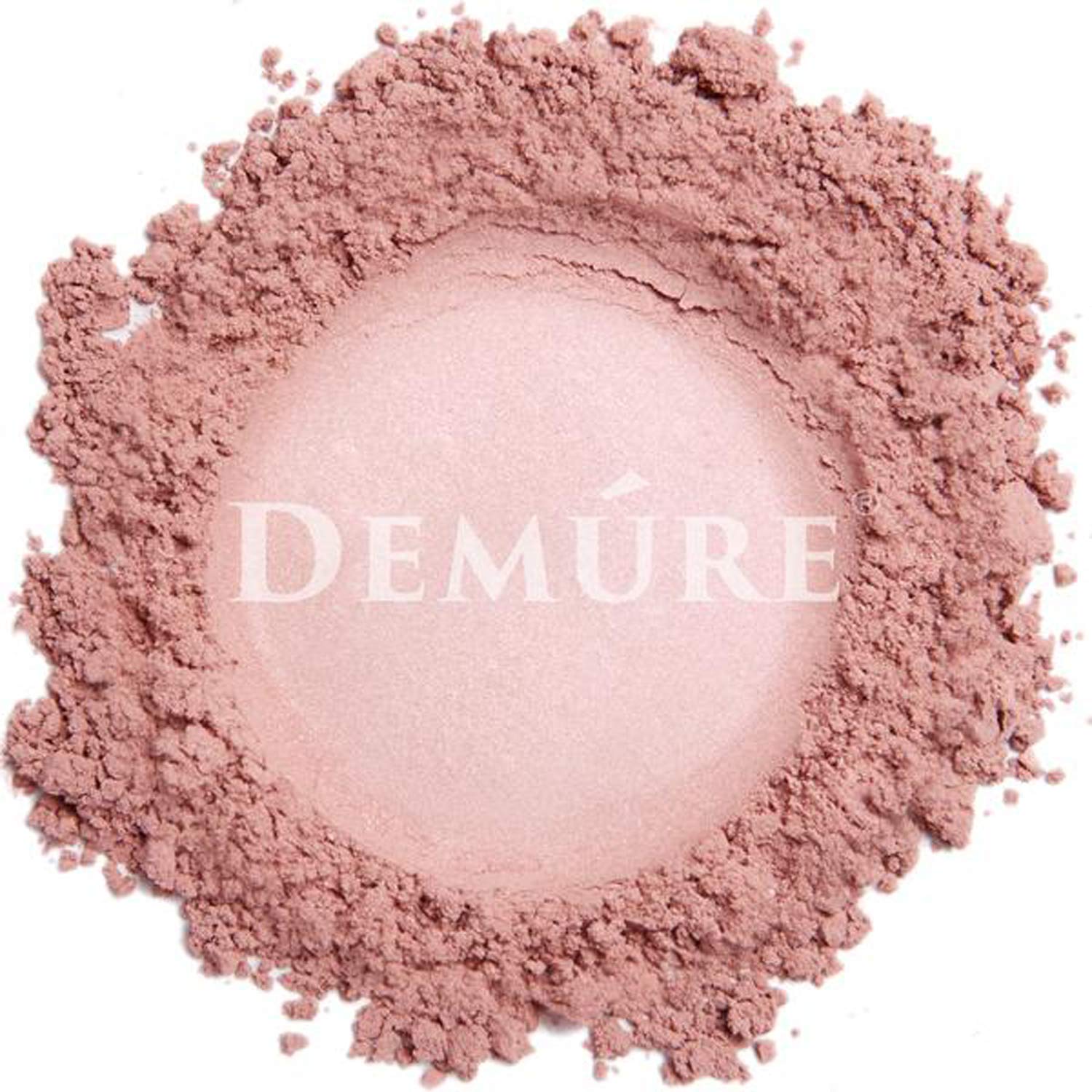 DEMÚRE swatch on arm under studio light showing true Hint of Pink pigmentation