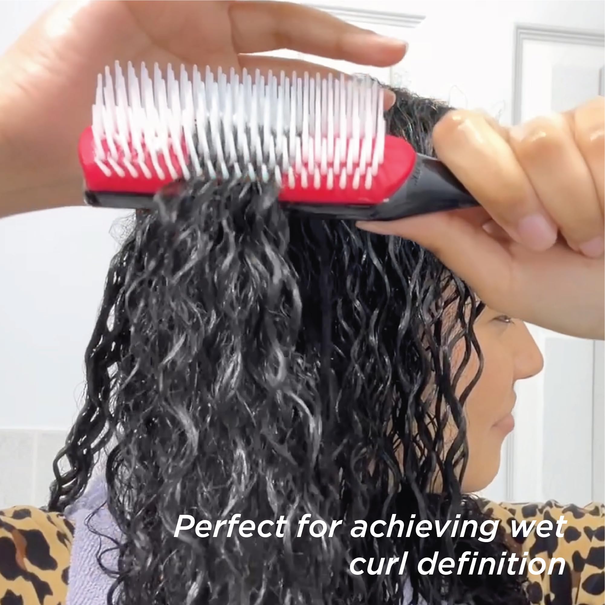 Denman D3 results showing defined, bouncy curls after styling with the brush