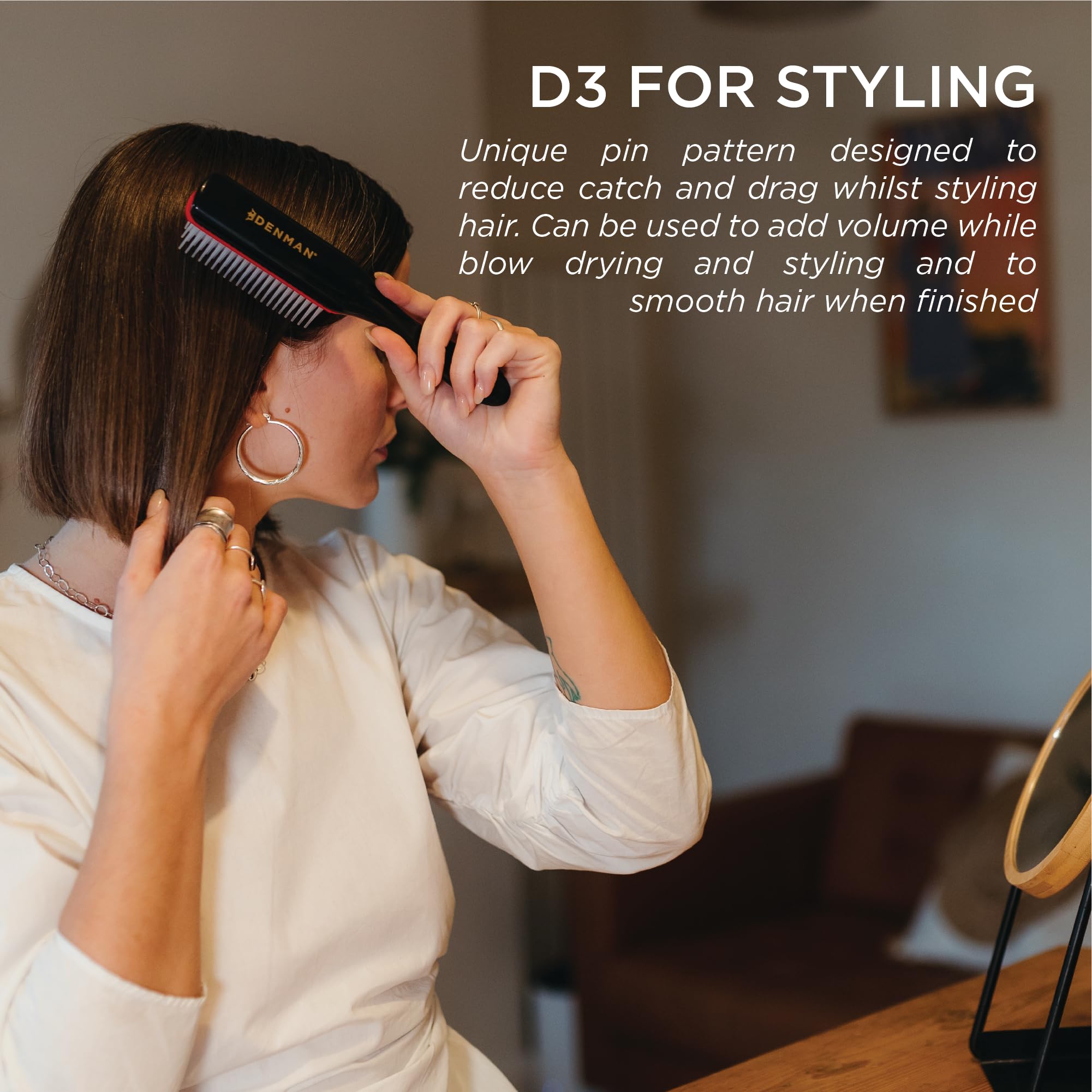 Denman D3 used on wet hair to evenly distribute product and define curl clumps