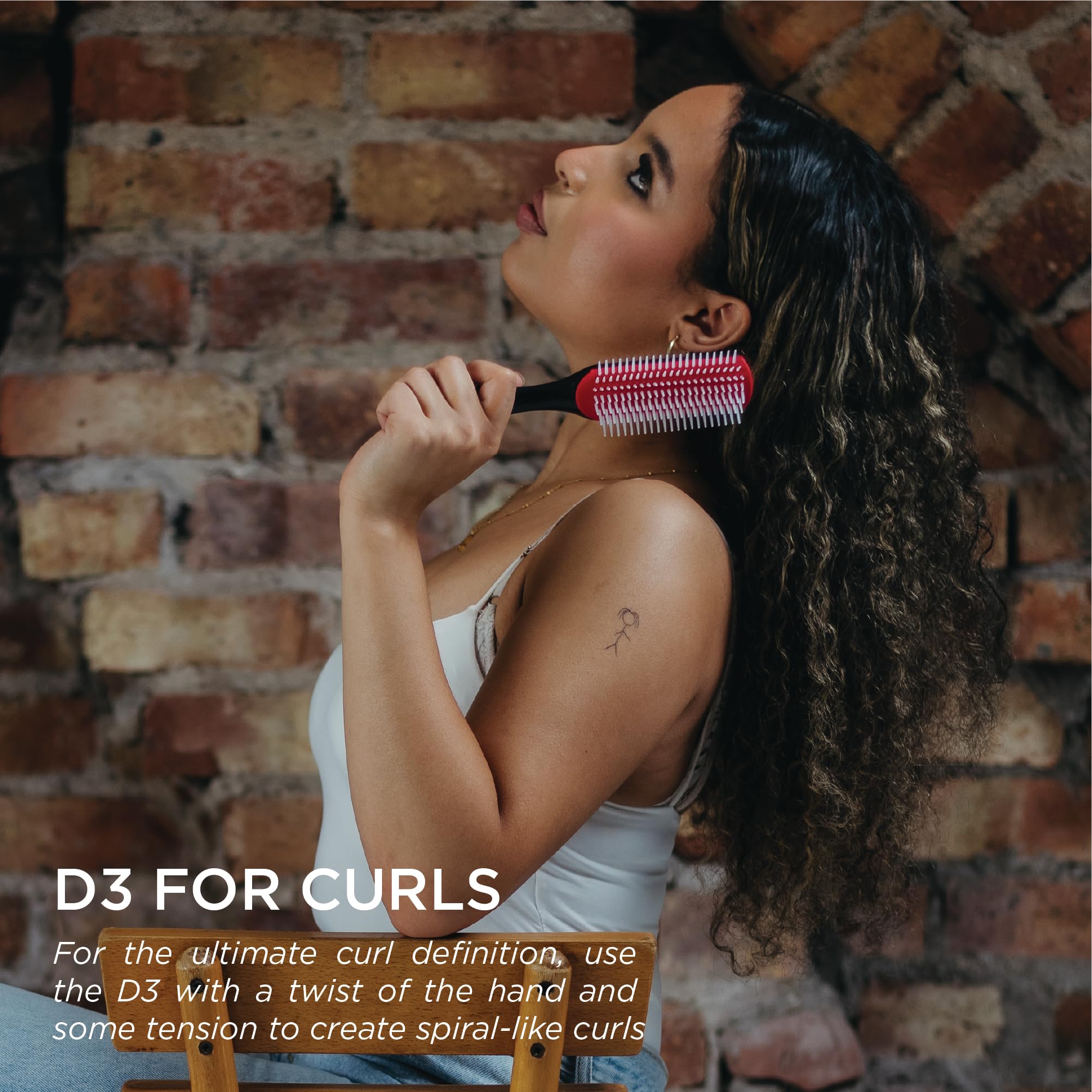 Denman D3 ergonomic handle demonstrating comfortable grip for longer styling sessions