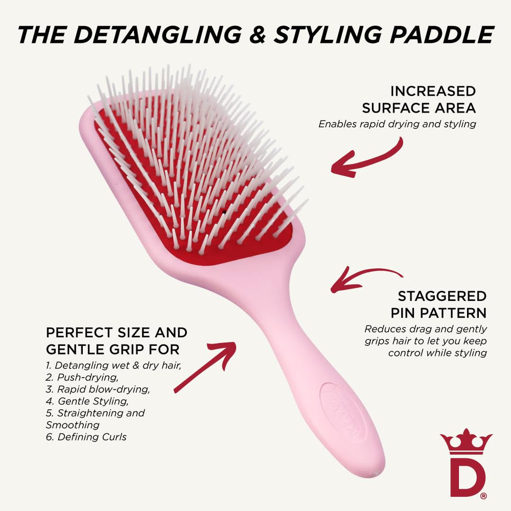 Denman brush being used on curly hair to define clumps and reduce frizz