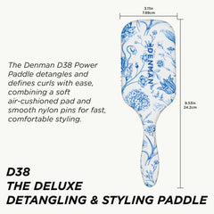 Denman close-up of tapered pins and air-cushioned pad for gentle detangling