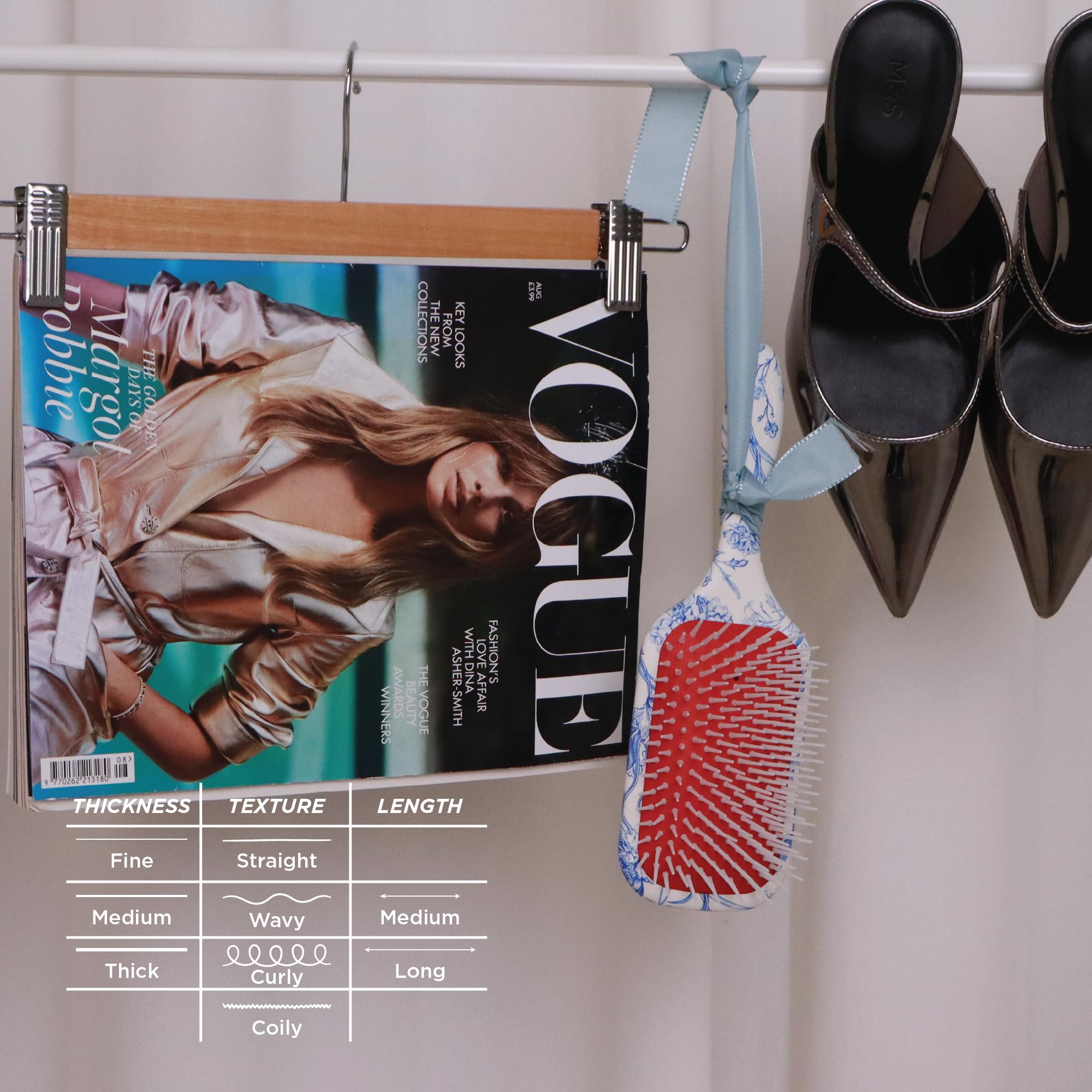 Denman on bathroom vanity illustrating everyday styling convenience