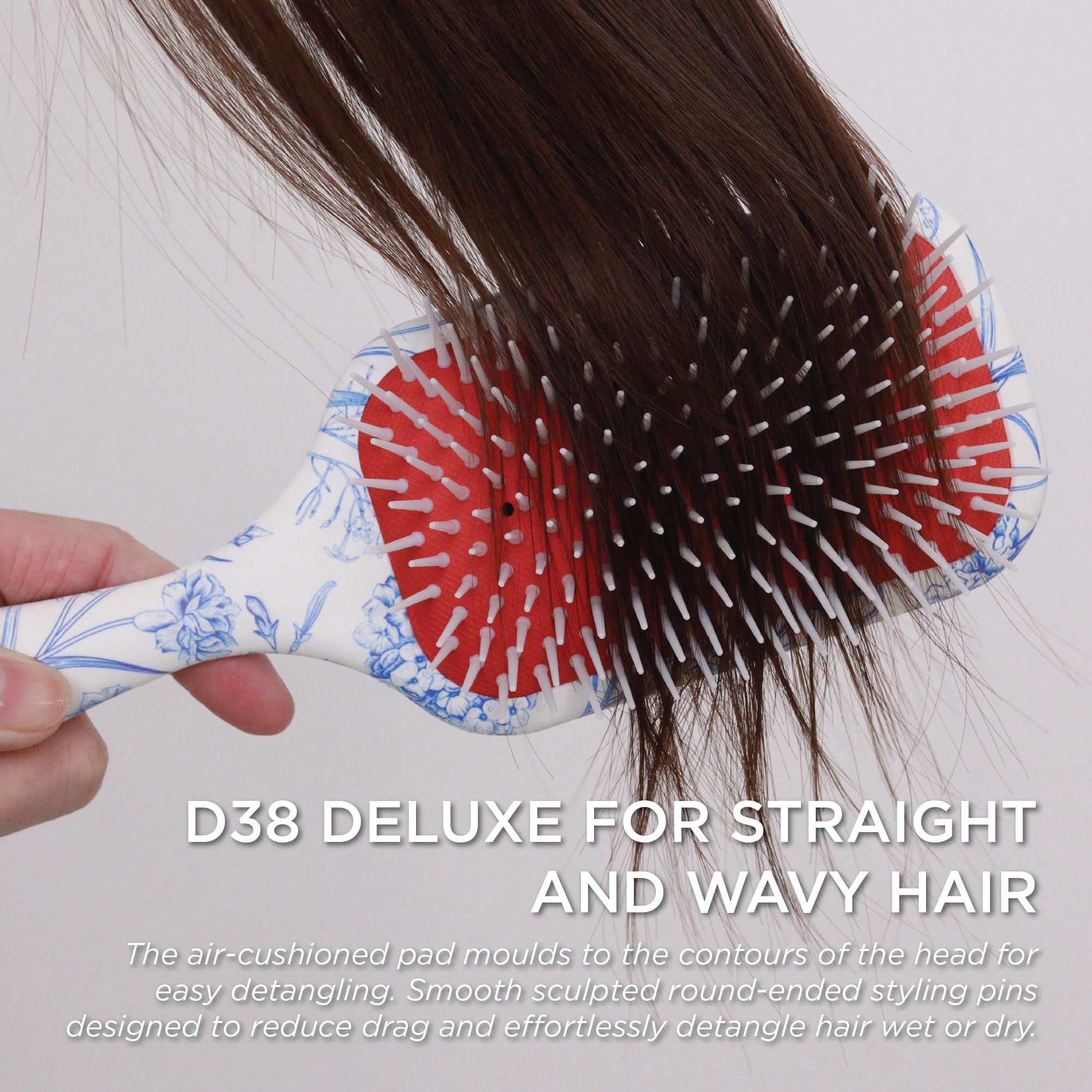 Denman side profile highlighting ergonomic handle for secure grip