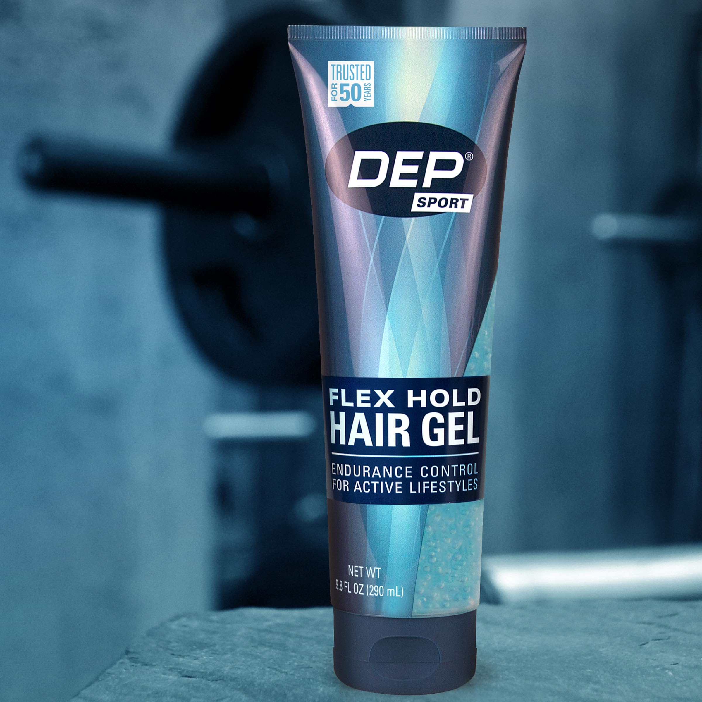 Dep 9.8 oz tubes next to a ruler showing size and travel-friendly benefit