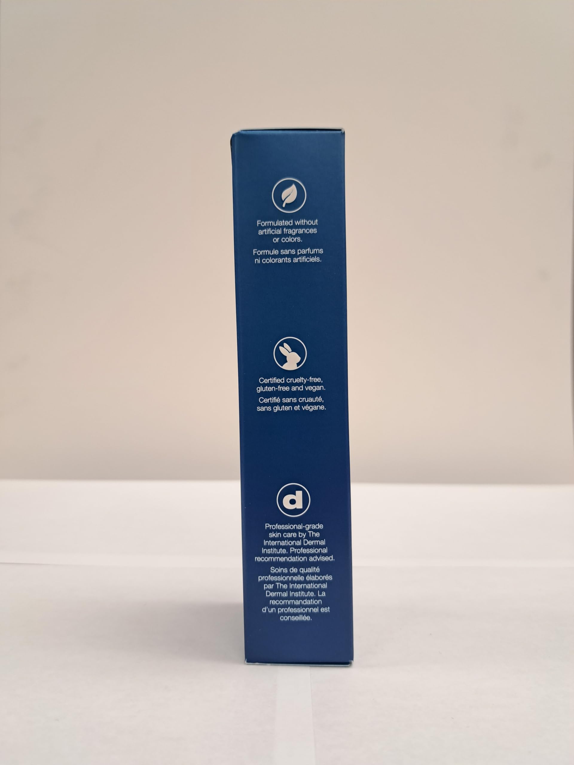 Dermalogica jar next to a ruler showing scale and portable size