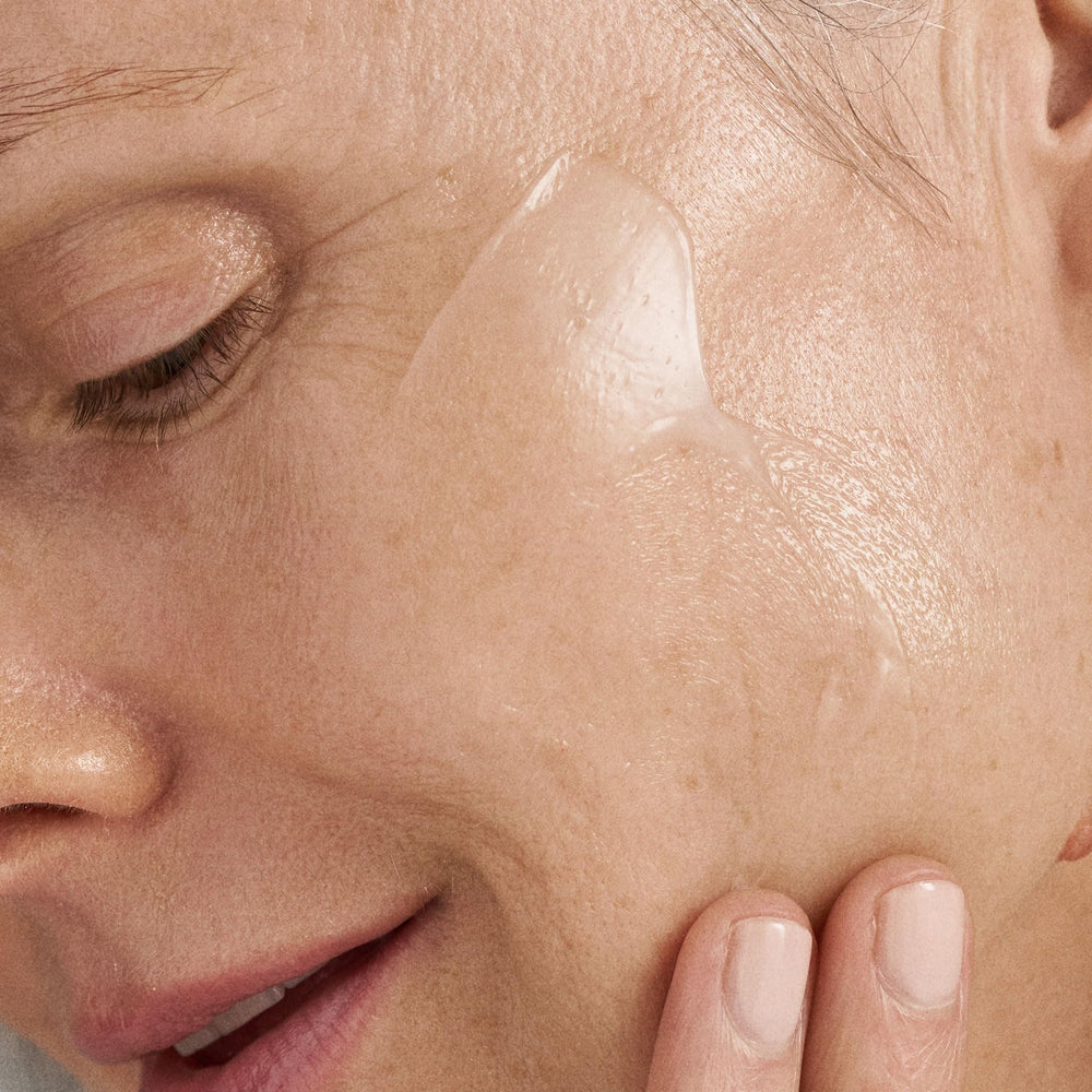 Dermalogica open jar top view revealing gel‑cream ready for application