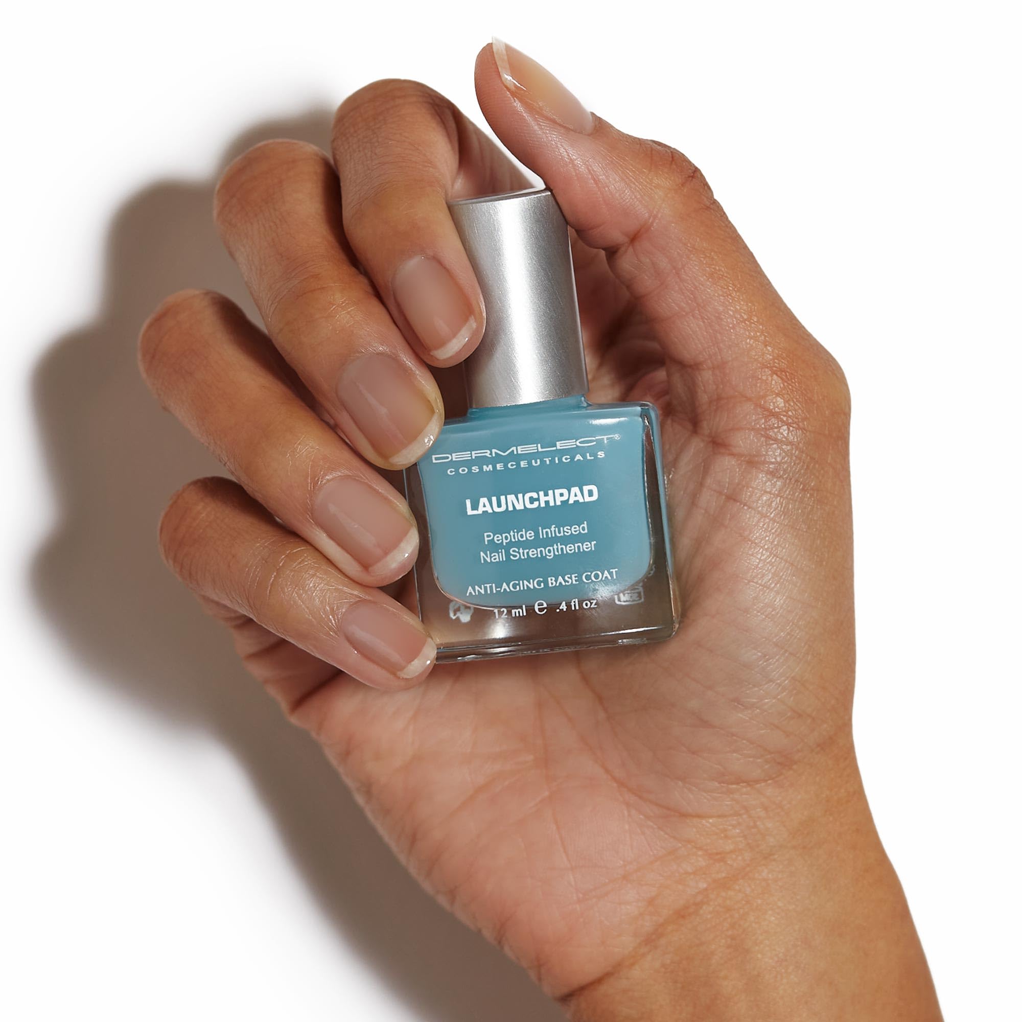 Dermelect Launchpad cap and brush detail for precise application benefit