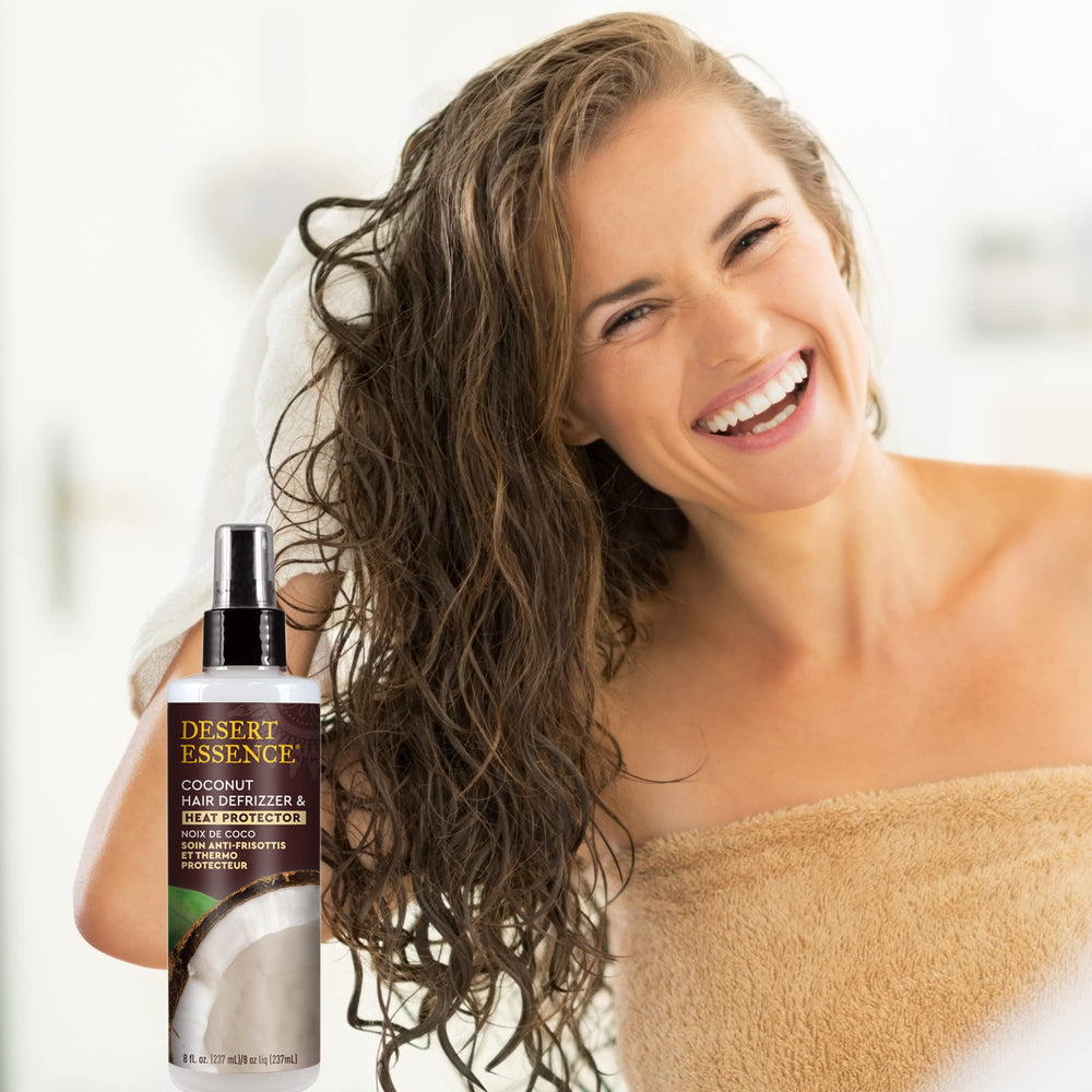 Desert Essence bottle on bathroom shelf in a bright lifestyle setting