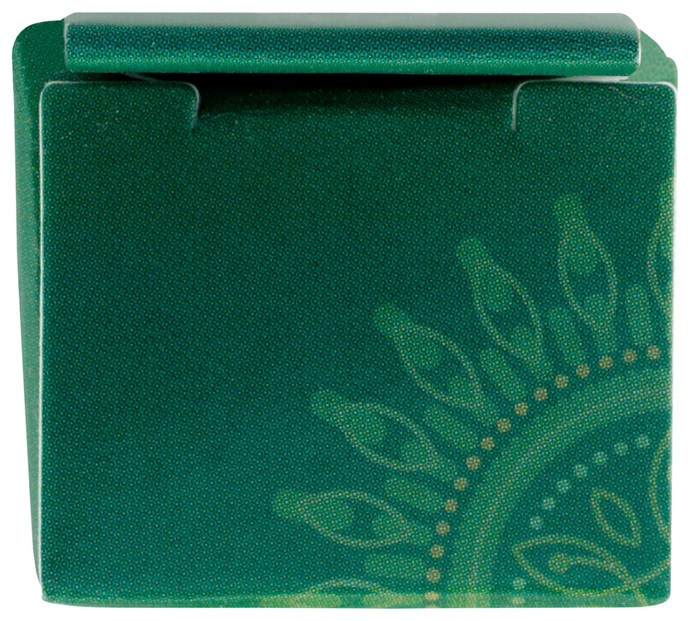 Desert Essence stick texture close-up demonstrating non-oily, quick-absorbing formula benefit