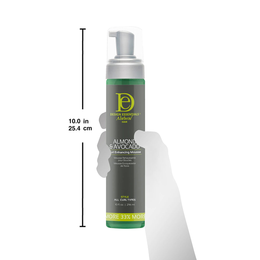 Design Essentials bottle in hand to show 10 fl oz scale and portability