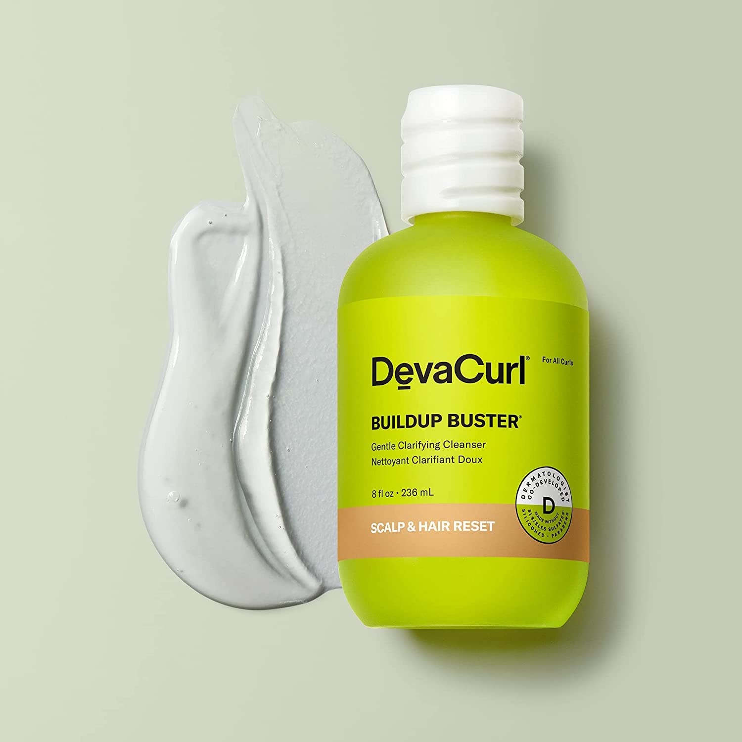 DevaCurl label close-up with pump, highlighting ingredient benefits and directions