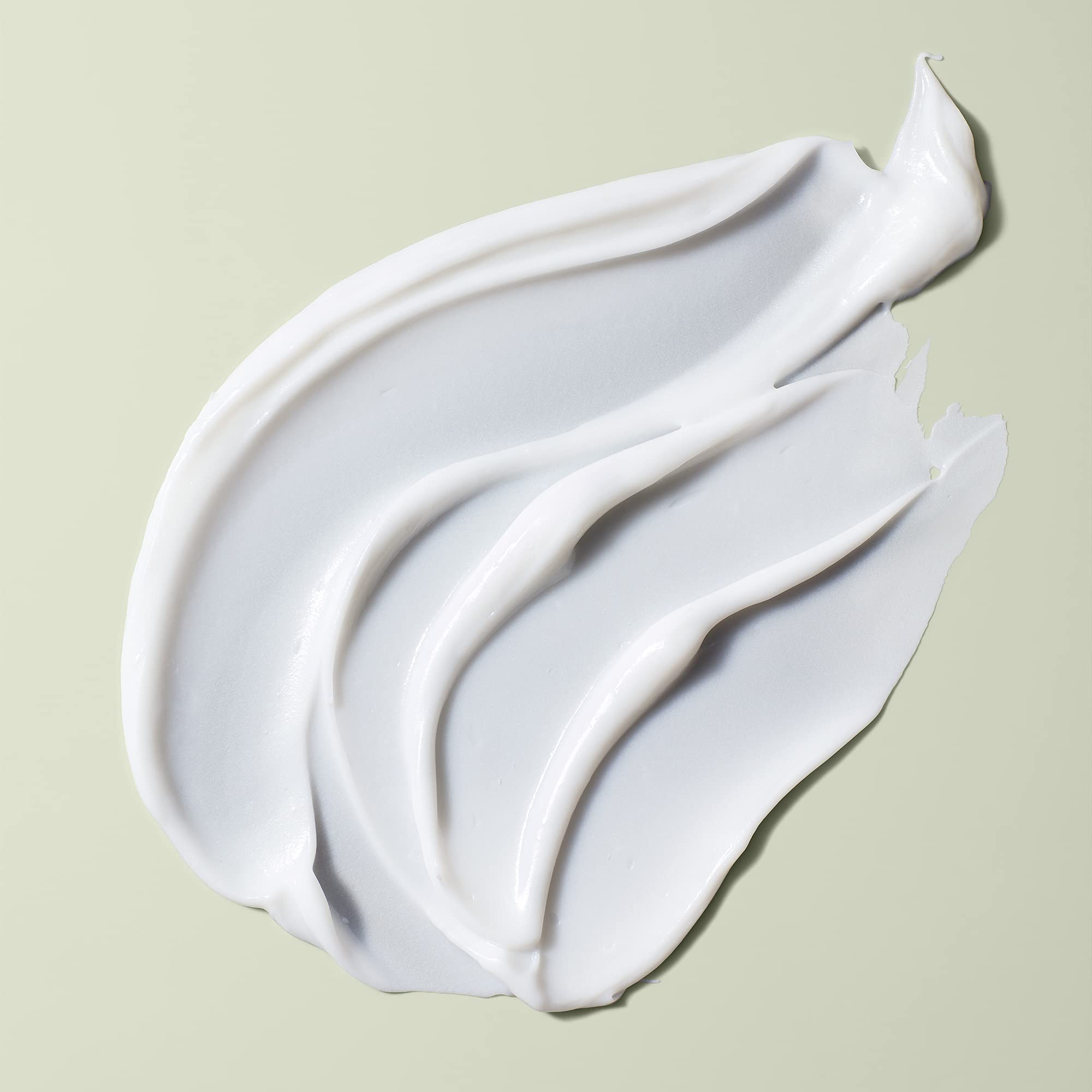 DevaCurl creamy conditioner texture close-up for intense hydration