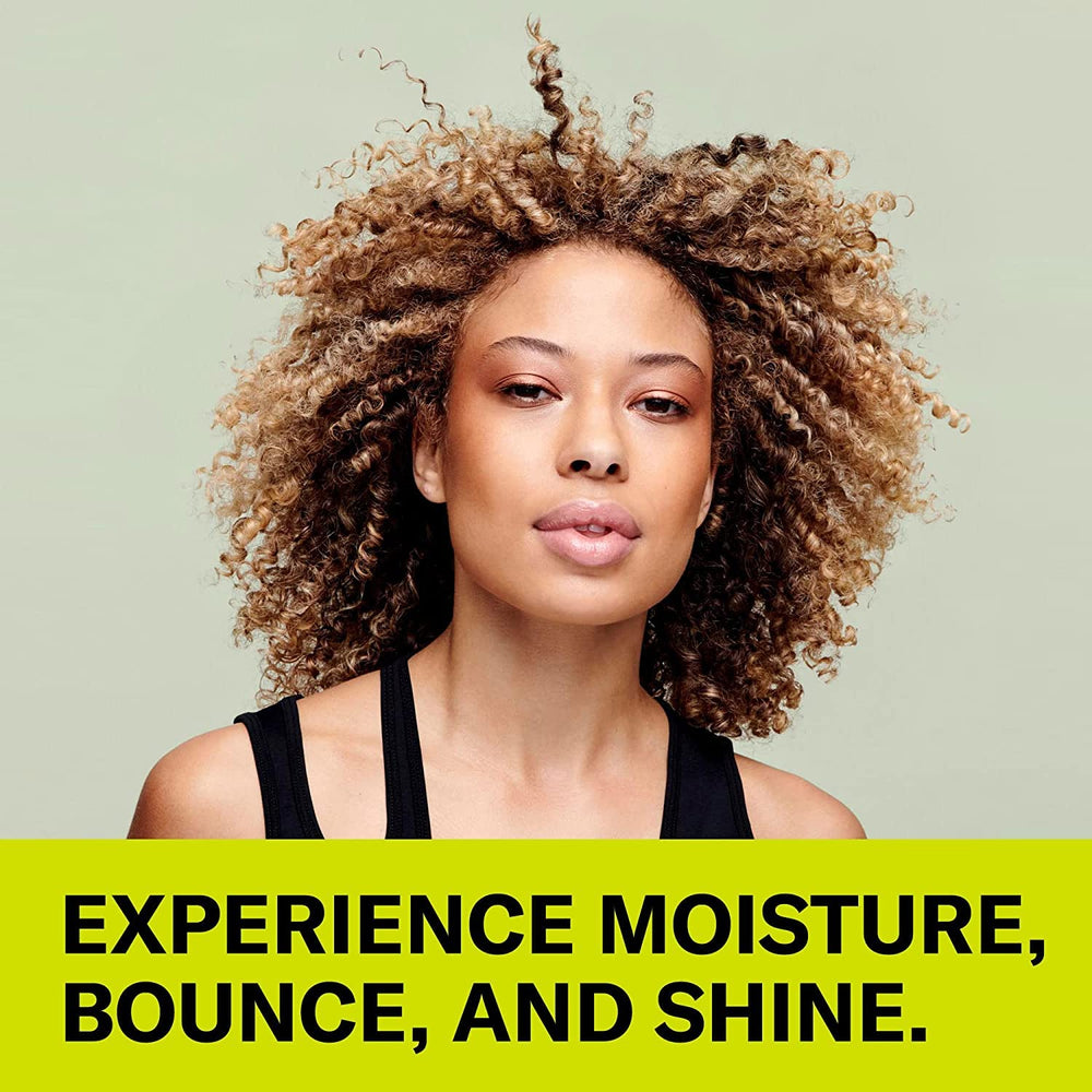 DevaCurl jar held in hand showing 5 fl. oz. scale and travel-friendly convenience