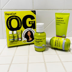 DevaCurl styling cream in hand demonstrating smooth application and curl shaping
