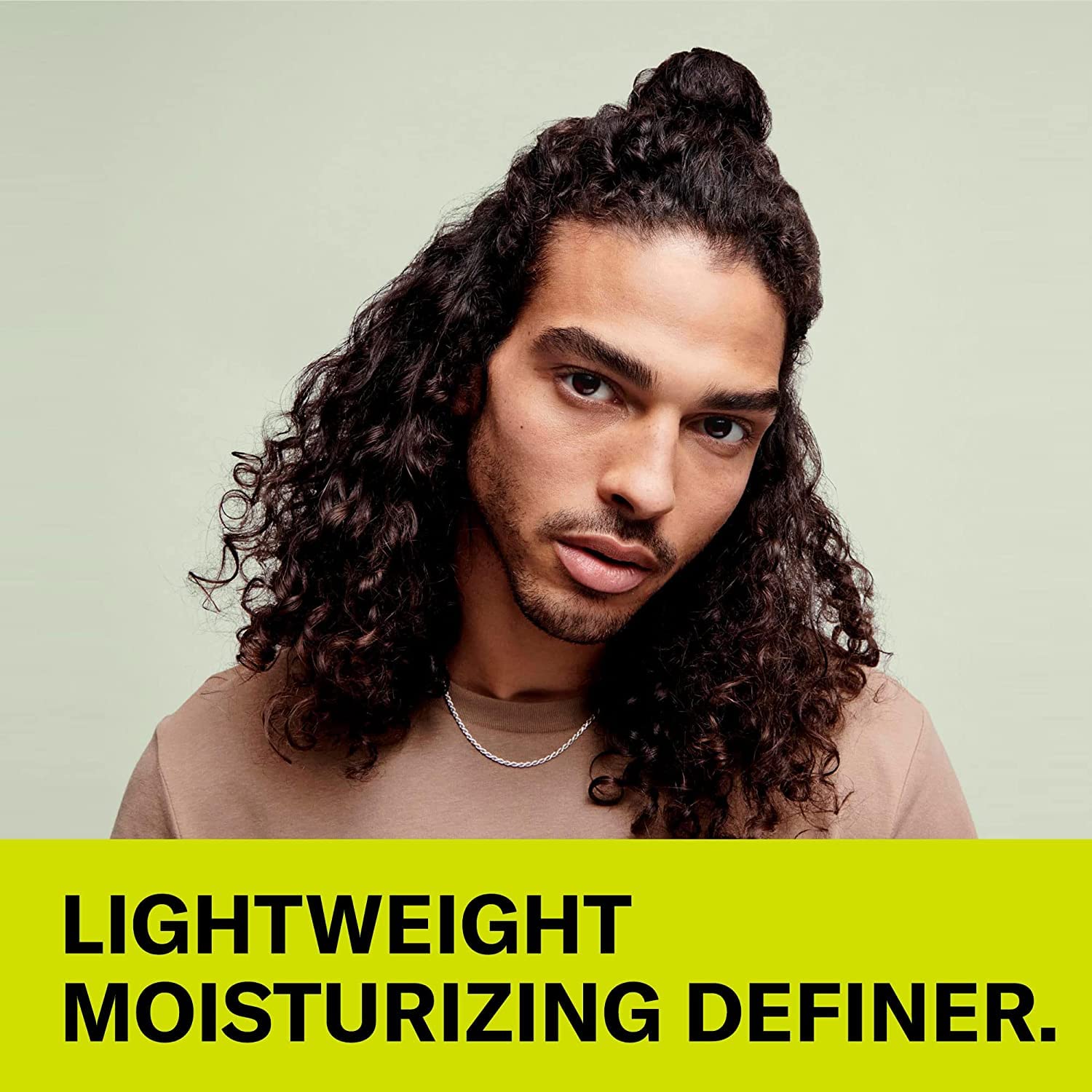 DevaCurl Wave Maker being applied to hand before styling for easy distribution benefit