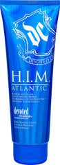 Devoted Creations bottle front view showing blue-hued bronzer and scent benefits