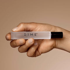 DIME core memory spray action in hand demonstrating quick refresh benefit on the go