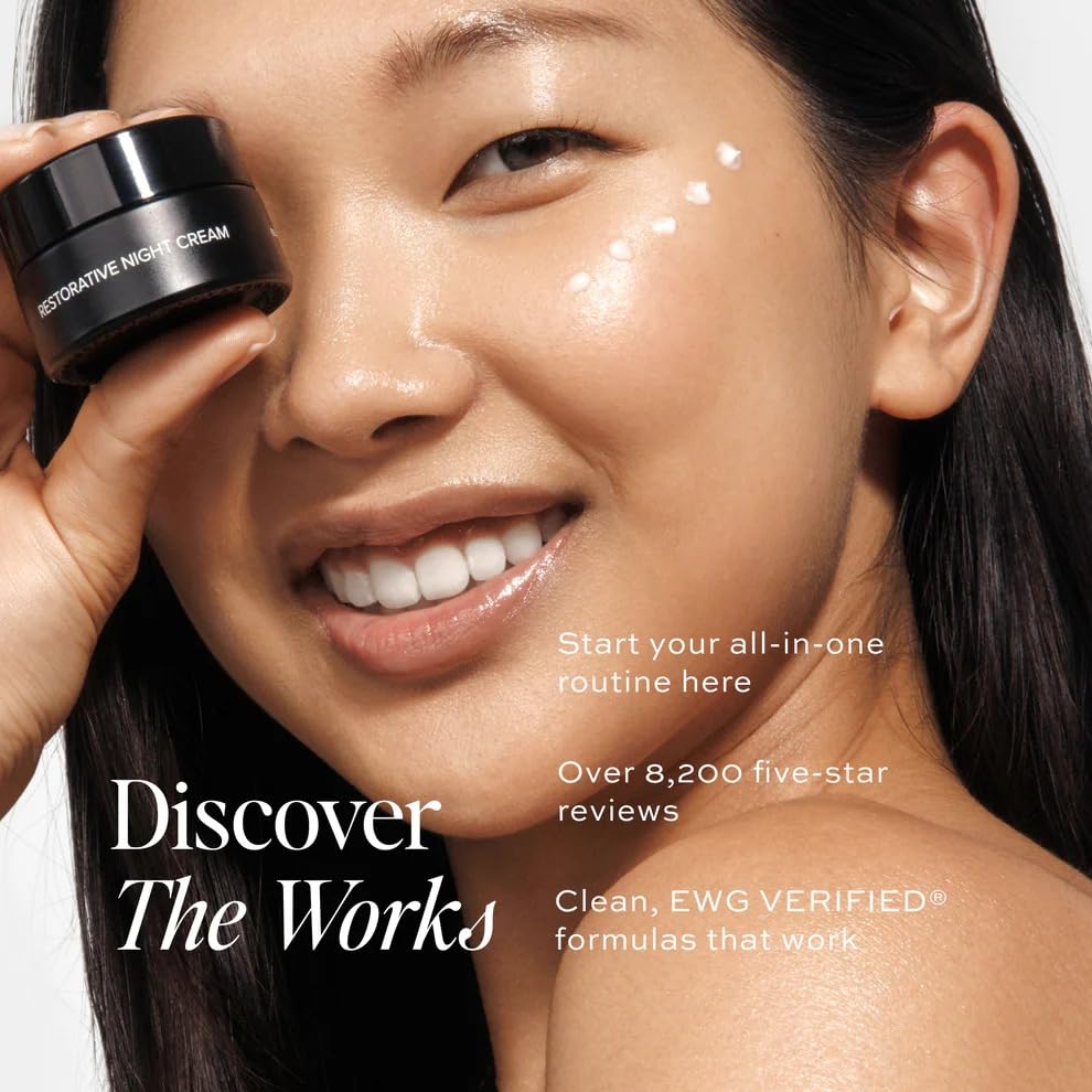 DIME Restorative Night Cream beside a bedside lamp for overnight repair