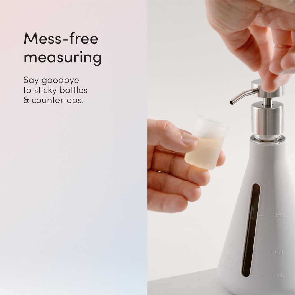 Dirty Labs silicone measuring beaker detail showing clear markings for accurate dosing