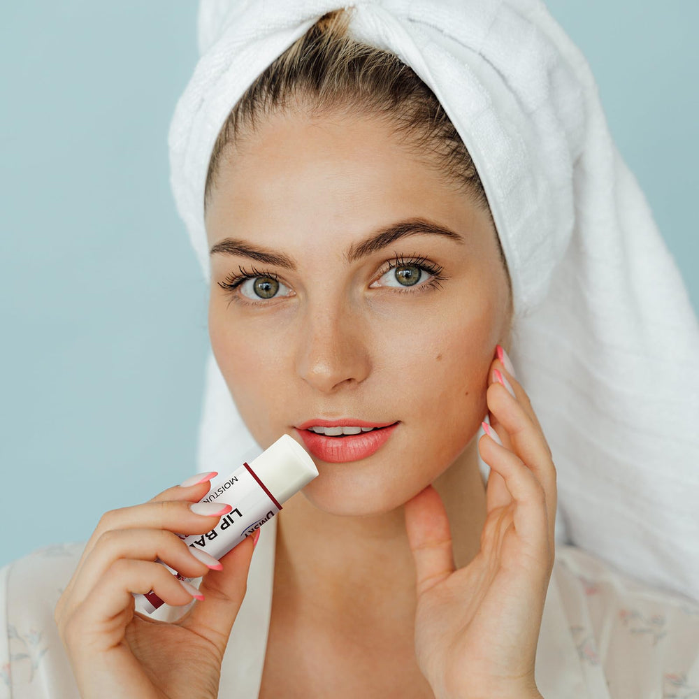 Dmsky single tube in hand showing compact 0.15 oz size for portability