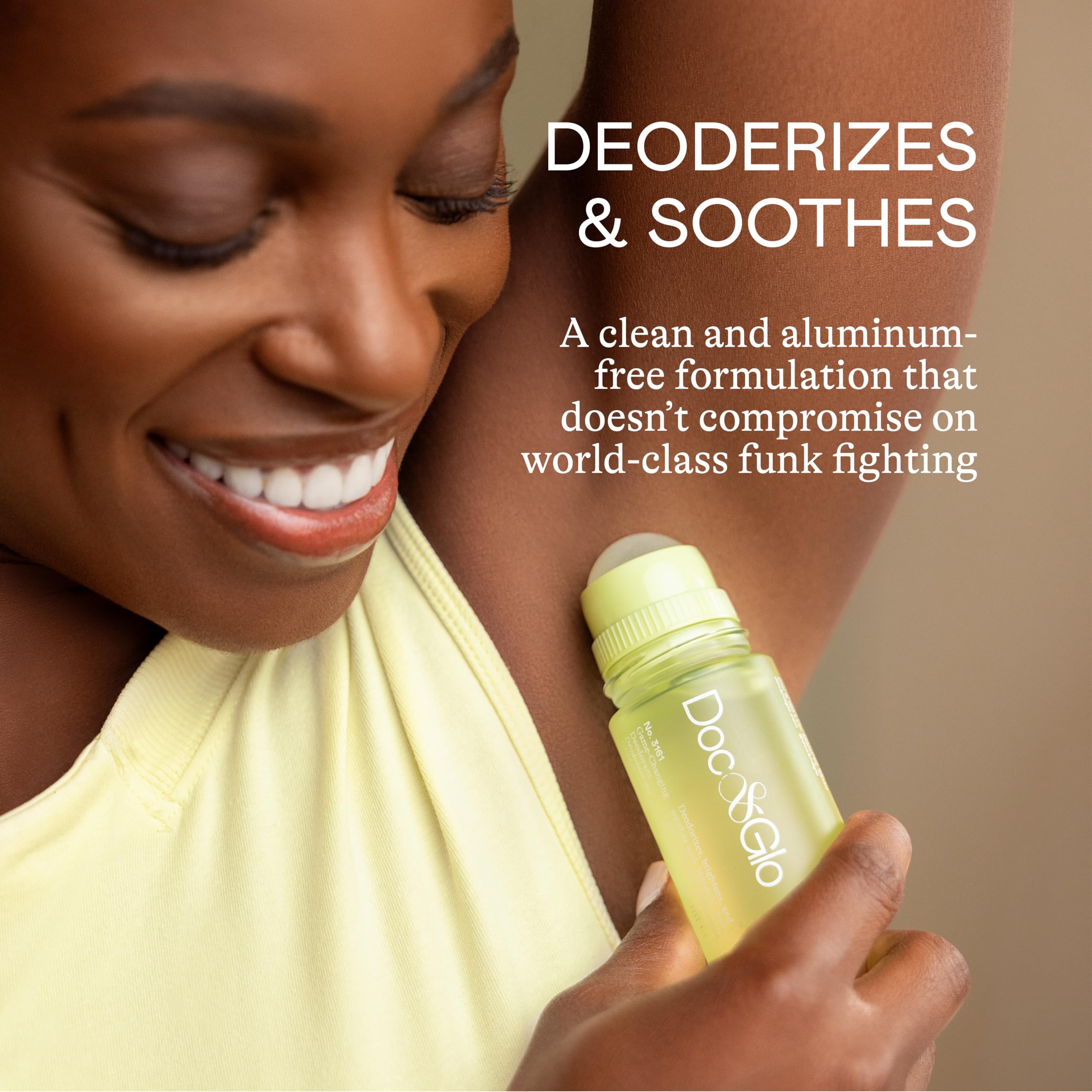 Doc & Glo roll-on applying underarm for quick midday refresh