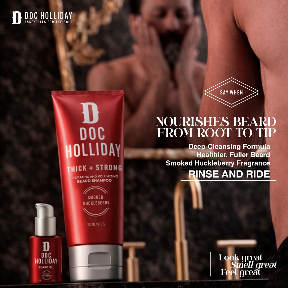 DOC HOLLIDAY bottle beside razor for scale to show travel-friendly size and routine fit
