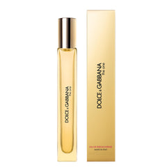 Dolce&Gabbana side profile of the travel bottle highlighting silhouette and amber tone
