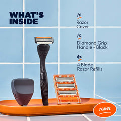 Dollar Shave Club close-up of four-blade cartridge highlighting easy-rinse blade spacing