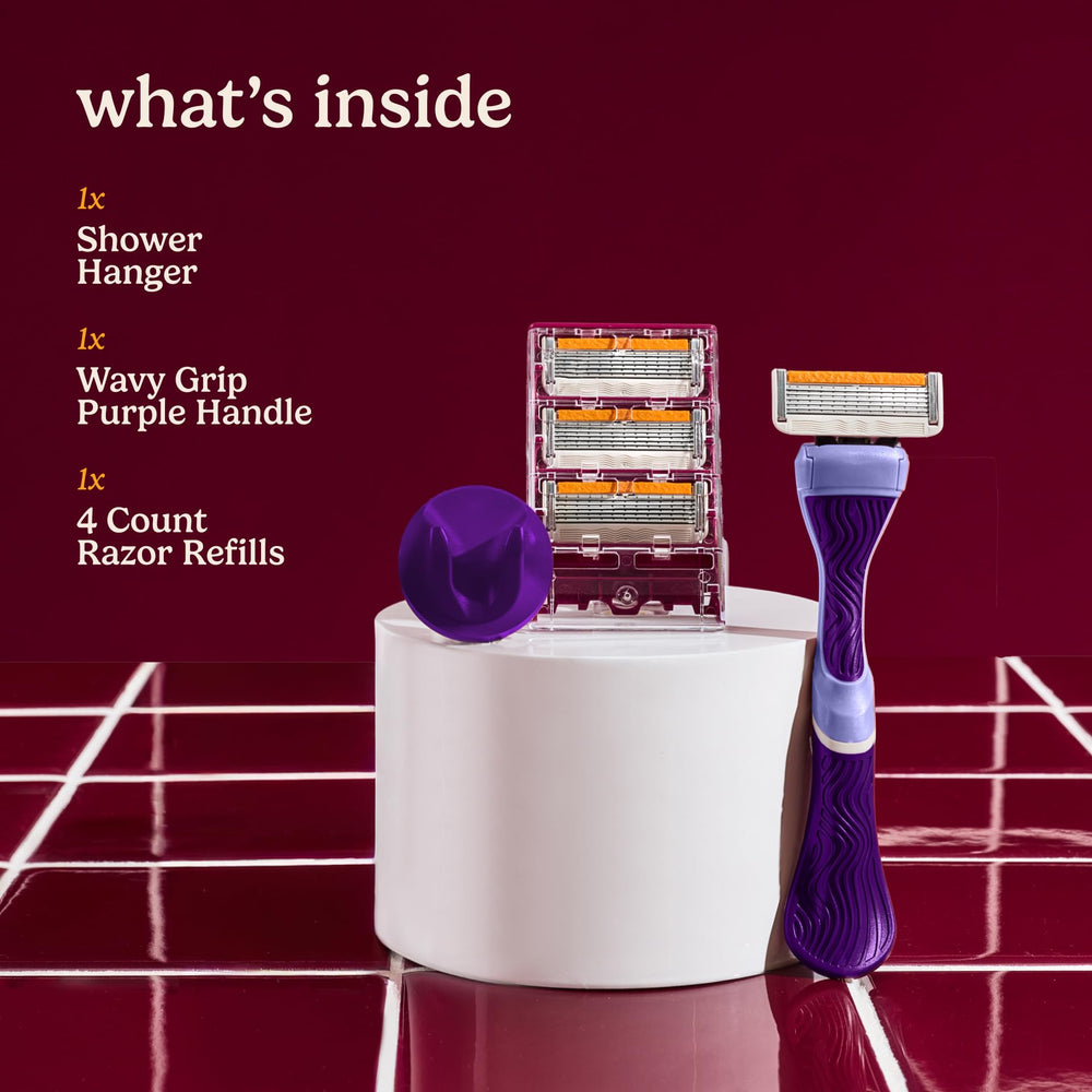 Dollar Shave Club six-blade cartridge close-up demonstrating smooth, precise shave