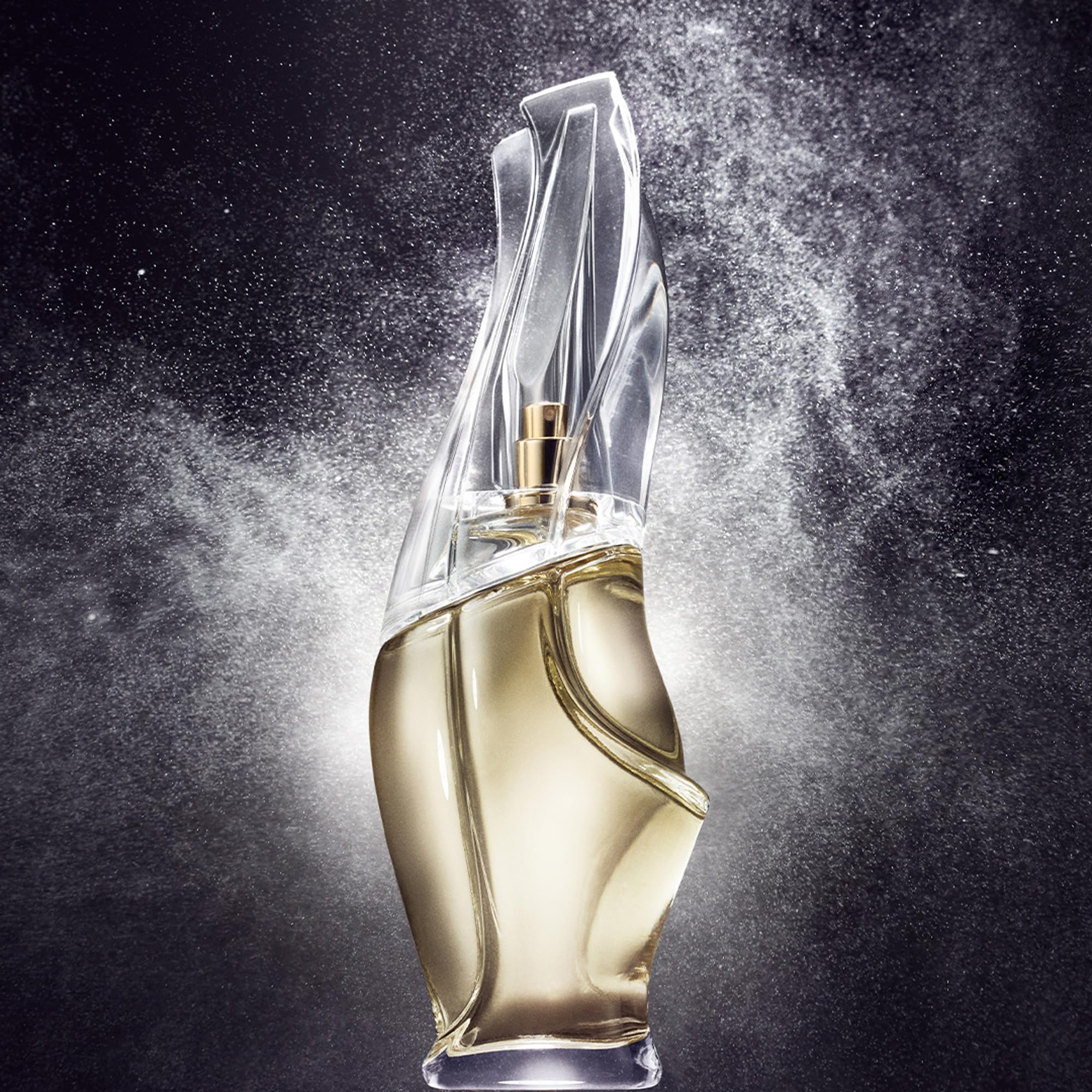 Donna Karan Cashmere Mist nozzle close-up illustrating precise atomizer benefit