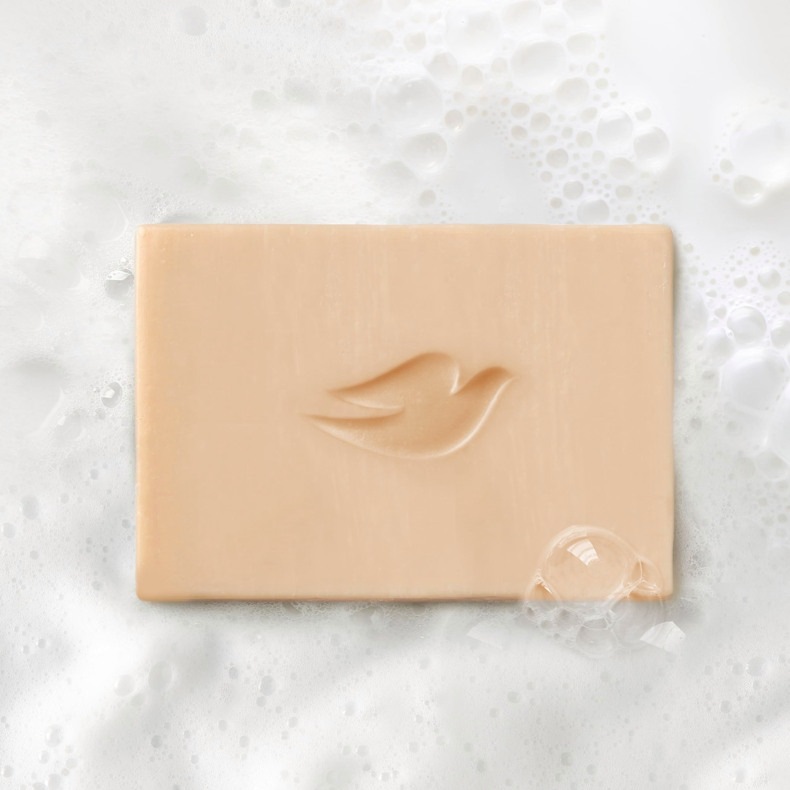Dove coconut milk and lychee ingredients styled to convey natural scent benefit