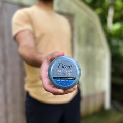 Dove Men+Care cream applied to jawline and cheeks for post-shave comfort and barrier support
