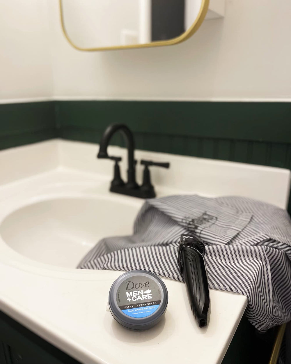 Dove Men+Care jar next to wallet to show travel-friendly size and convenient portability