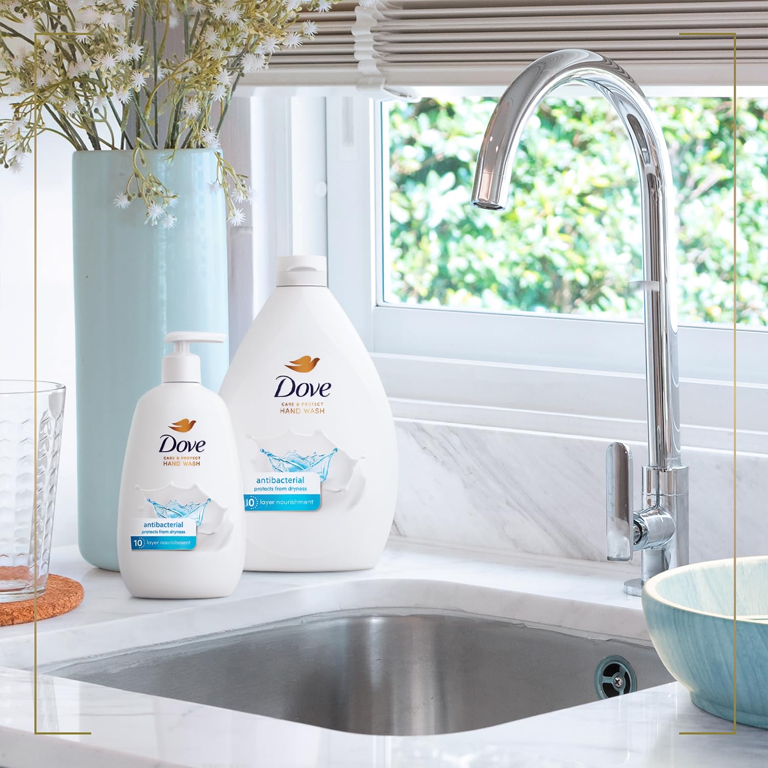 Dove bottle next to a hand for scale showing generous sizes and refill practicality