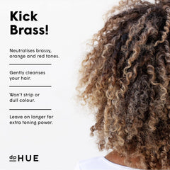 dpHUE shampoo dispensing into hand with blue tint for toning
