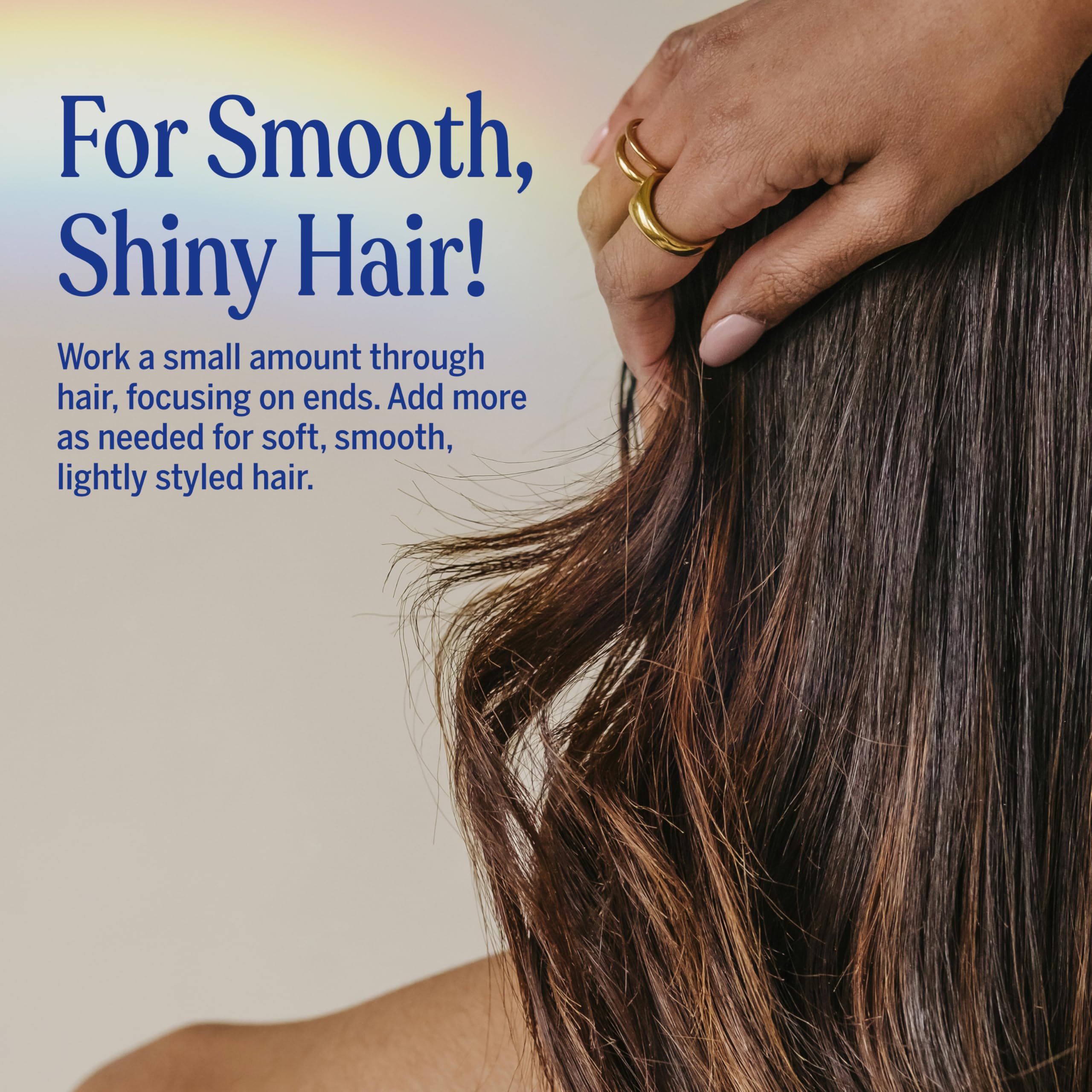 Dr. Bronner's applied to damp hair demonstrating frizz control and manageability