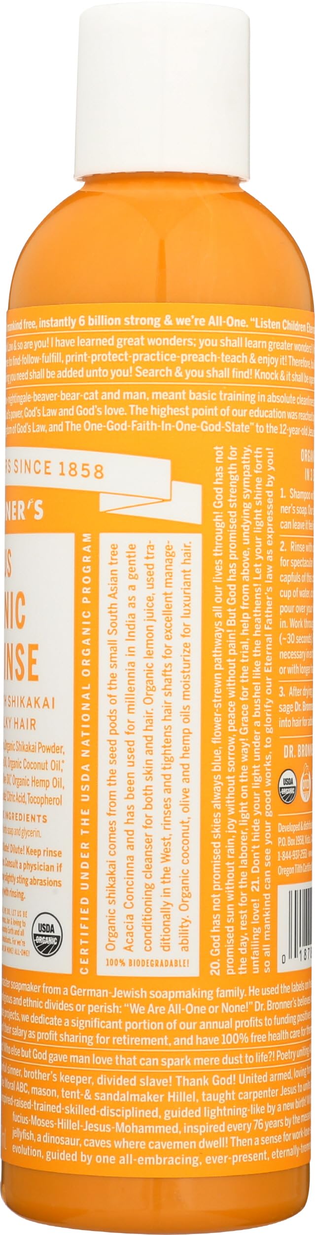 Ingredient panel close-up on Dr. Bronner's bottle, verifies organic and fair-trade benefit