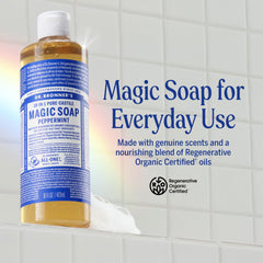 Dr. Bronner's peppermint soap pouring from open cap demonstrating concentrated formula