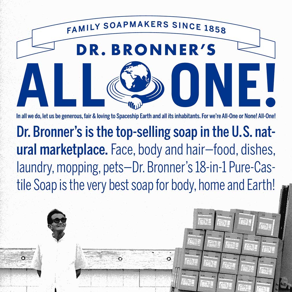 Dr. Bronner's bottle in hand for scale showing convenient everyday size benefit