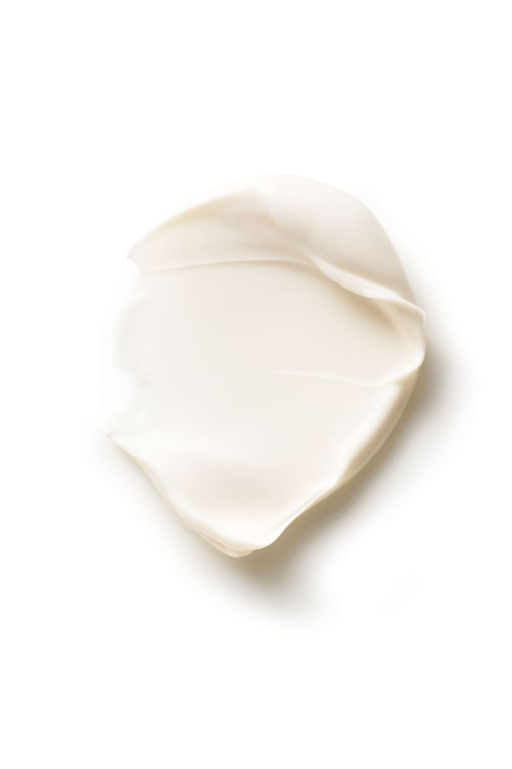 Removing Dr. Hauschka mask with damp cloth for easy cleanup
