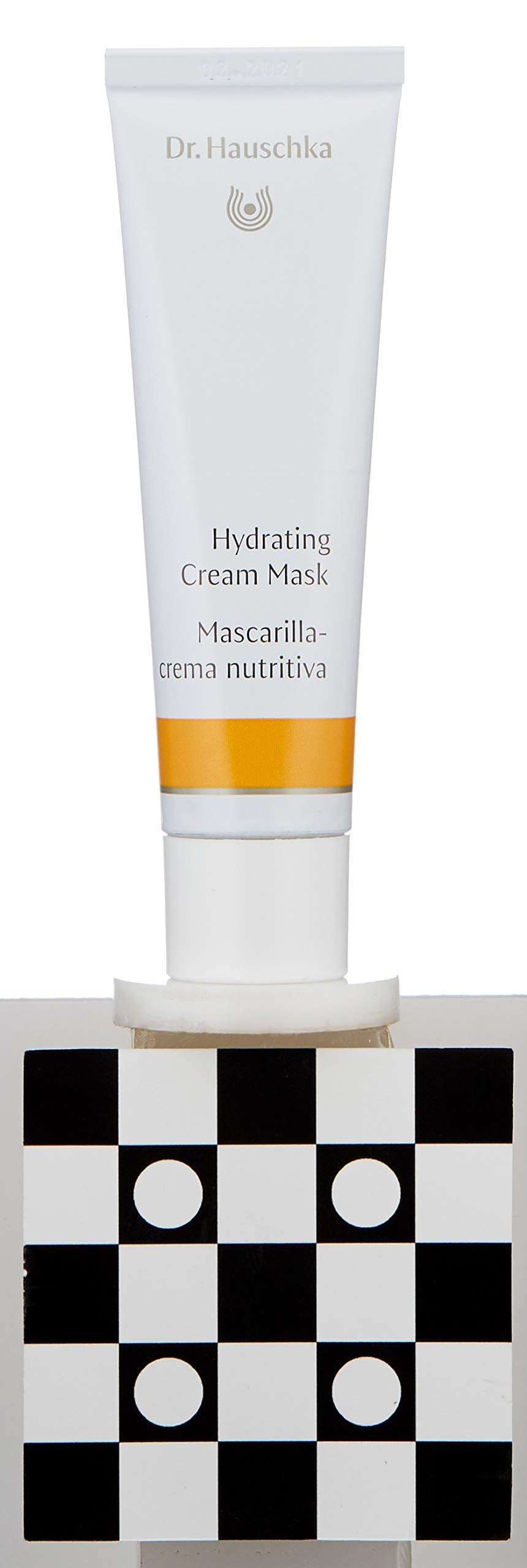 Outdoor lifestyle scene showing Dr. Hauschka protecting skin from wind